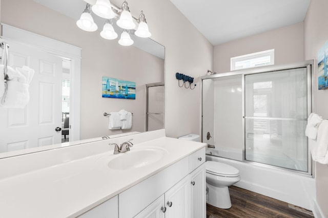 18 E Trigger Trl, Inlet Beach, FL 32461 - bathroom featuring vanity, combined bath / shower with glass door, wood finished floors, and plenty of natural light