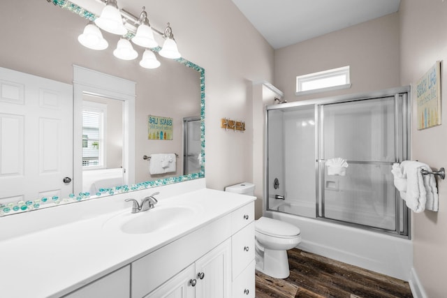 18 E Trigger Trl, Inlet Beach, FL 32461 - full bath featuring vanity, wood finished floors, healthy amount of natural light, and bath / shower combo with glass door
