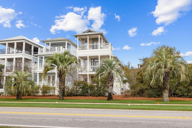18 E Trigger Trl, Inlet Beach, FL 32461 - view of front of home with a balcony and french doors