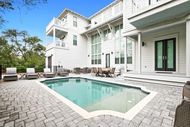 12 Seabreeze Way, Inlet Beach, FL 32461 - view of swimming pool featuring a patio, outdoor lounge area, and french doors