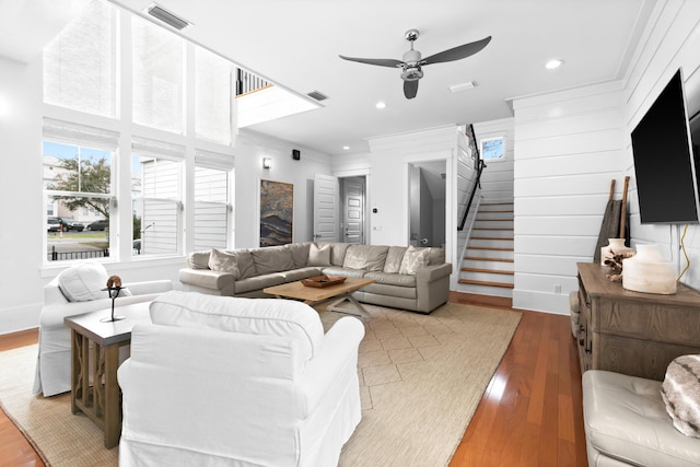 12 Seabreeze Way, Inlet Beach, FL 32461 - living area with stairs, a ceiling fan, wood finished floors, recessed lighting, and ornamental molding