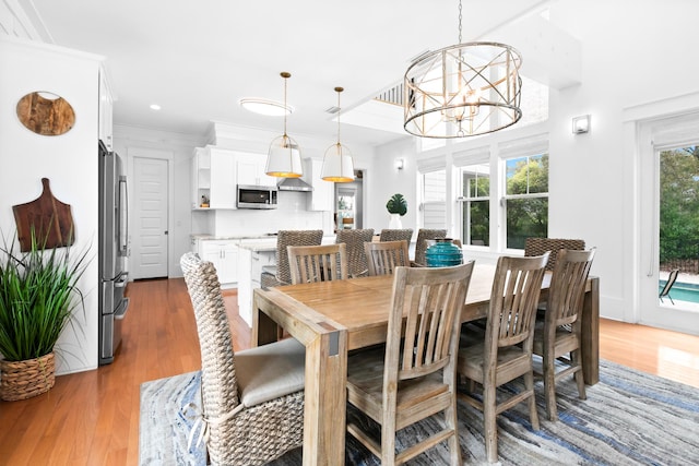 12 Seabreeze Way, Inlet Beach, FL 32461 - dining space with wood finished floors, a chandelier, and ornamental molding