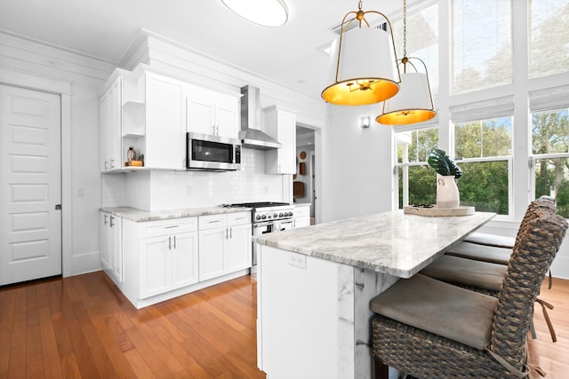 12 Seabreeze Way, Inlet Beach, FL 32461 - kitchen featuring open shelves, decorative backsplash, white cabinets, light wood-style floors, and appliances with stainless steel finishes