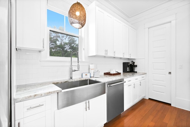 12 Seabreeze Way, Inlet Beach, FL 32461 - kitchen with white cabinets, dishwasher, backsplash, and crown molding