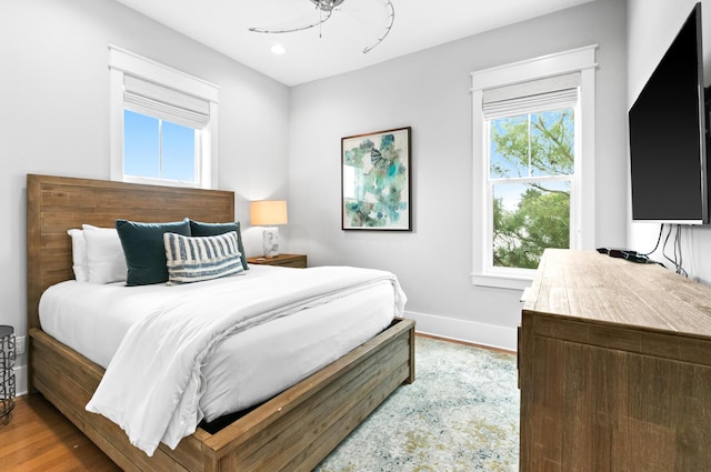 12 Seabreeze Way, Inlet Beach, FL 32461 - bedroom with light wood-type flooring, multiple windows, and recessed lighting