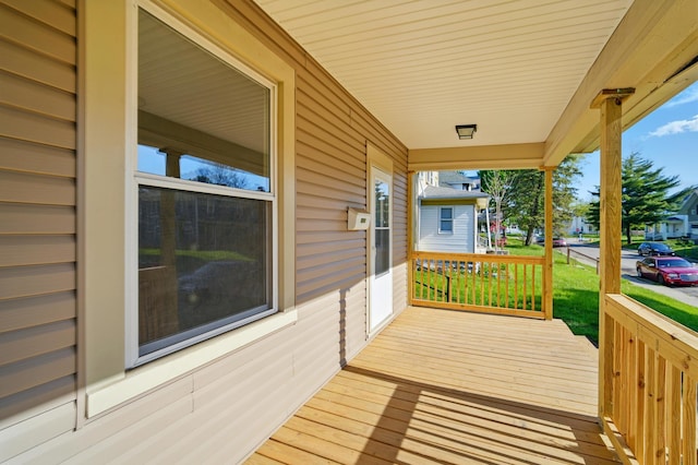 wooden deck featuring a porch