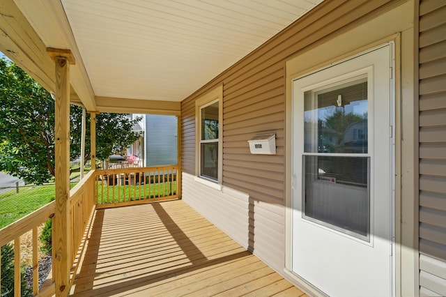 wooden deck featuring a porch