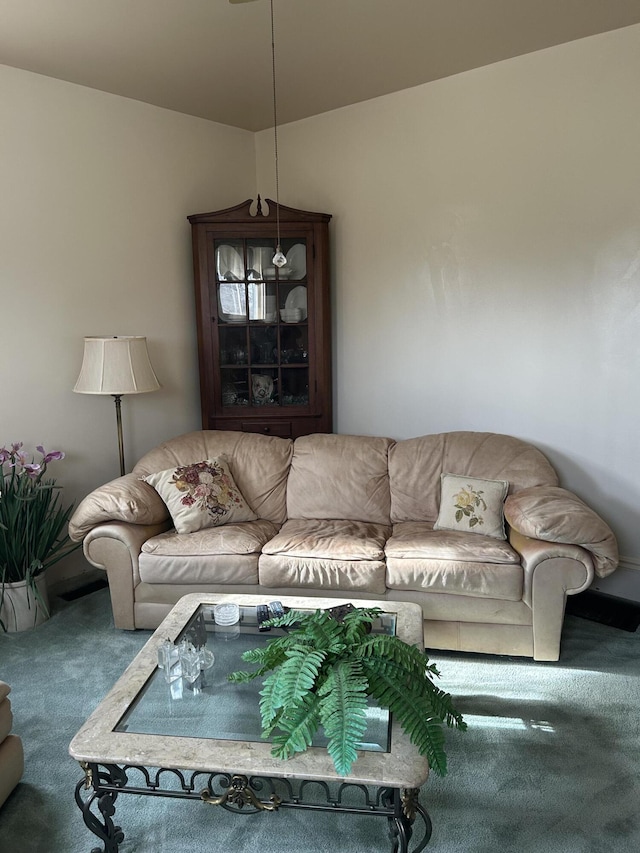 unfurnished living room featuring carpet flooring