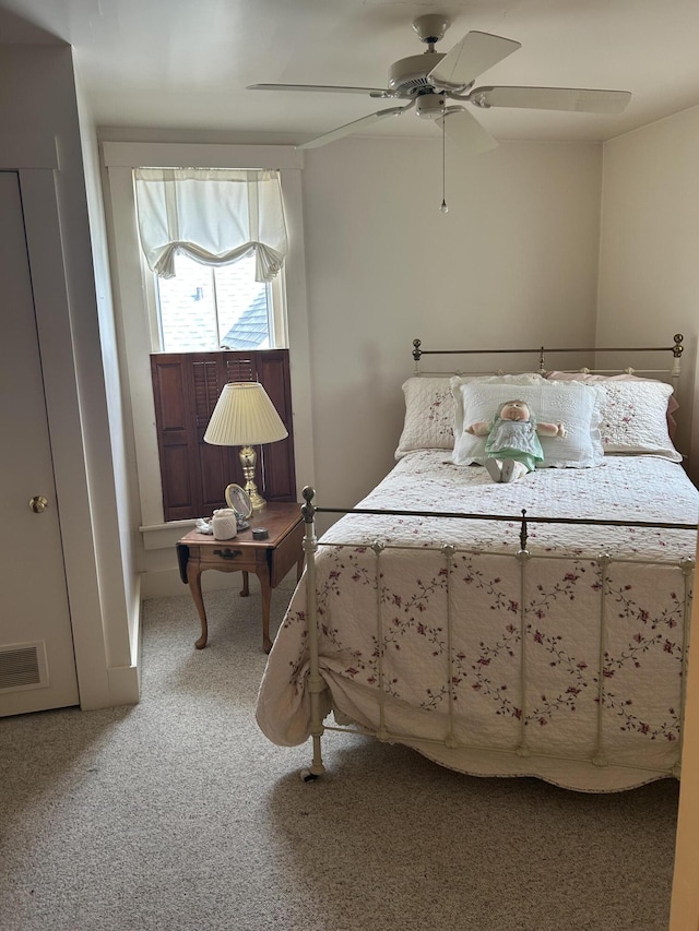 bedroom featuring carpet flooring and ceiling fan