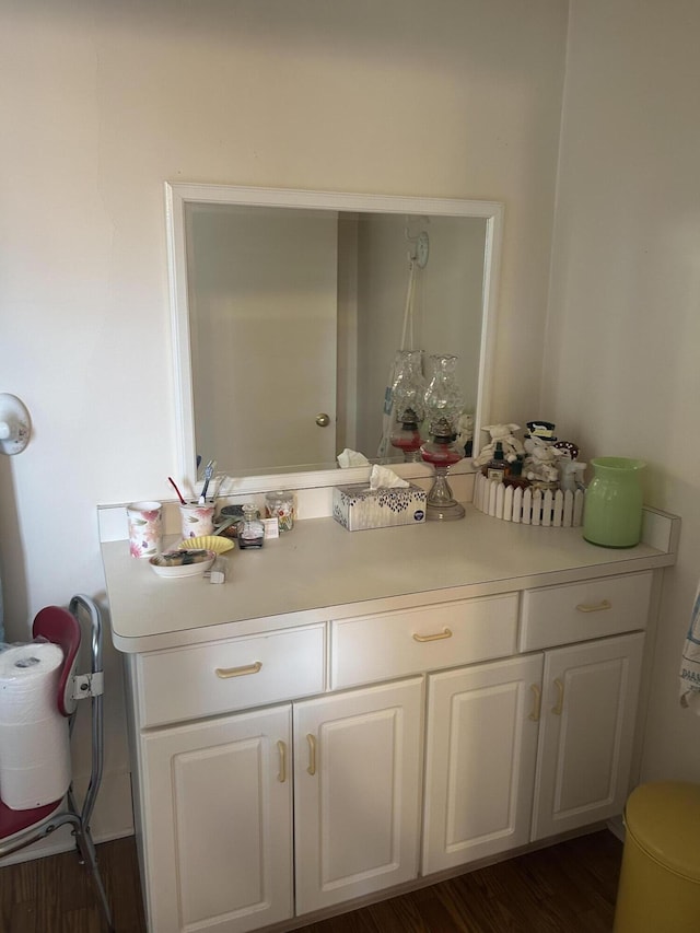 bathroom featuring vanity and hardwood / wood-style flooring