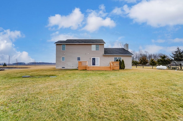 back of house featuring a yard and a deck