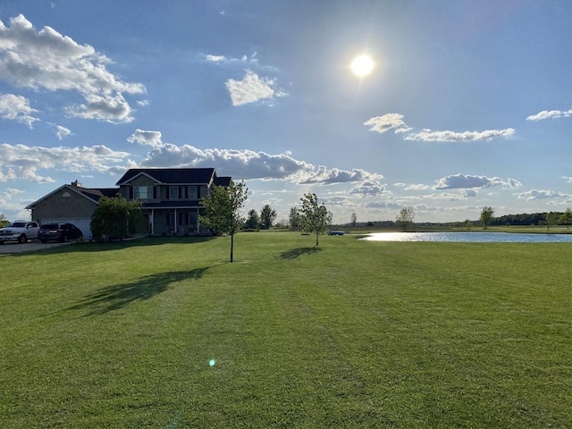 view of yard with a water view