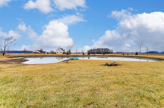 view of yard with a water view