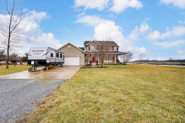 view of front of property with a garage, a porch, and a front lawn