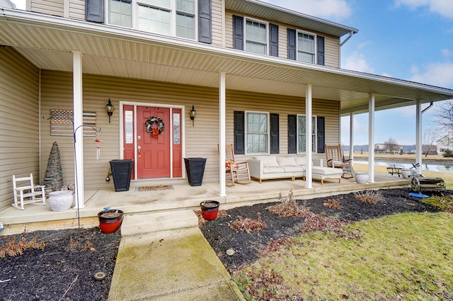 entrance to property with a porch