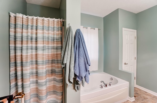 bathroom with a tub