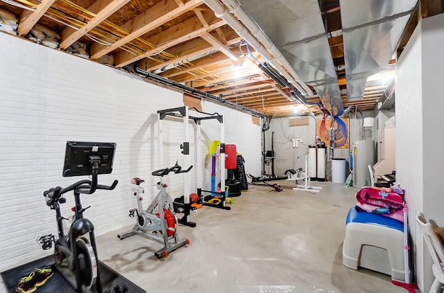 exercise room featuring water heater