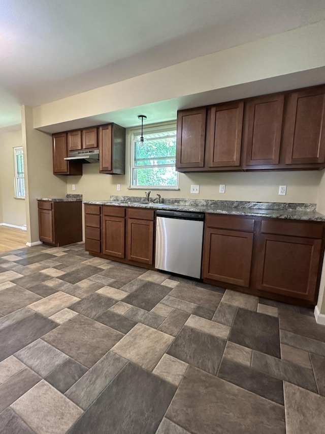 2336 Derr Rd, Springfield, OH 45503 - kitchen with stainless steel dishwasher, under cabinet range hood, hanging light fixtures, and stone countertops