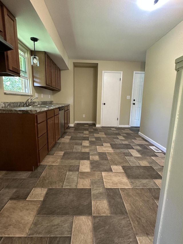 2336 Derr Rd, Springfield, OH 45503 - kitchen with stainless steel dishwasher and hanging light fixtures