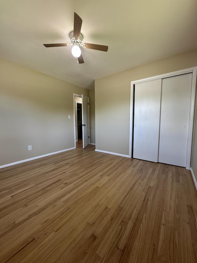 2336 Derr Rd, Springfield, OH 45503 - unfurnished bedroom with wood finished floors, a closet, and ceiling fan