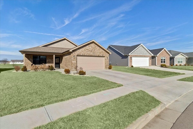 single story home featuring a garage, concrete driveway, a front lawn, and brick siding