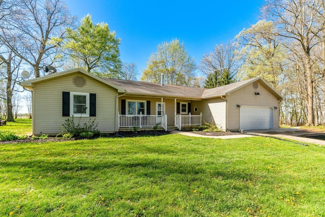 11851 Sanders Rd, Richwood, OH 43344 - ranch-style house with a garage, a front yard, covered porch, and driveway