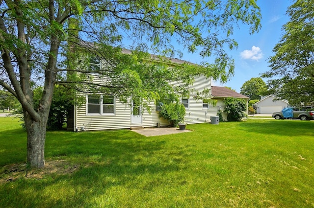 1985 Fox Run, Troy, OH 45373 - rear view of property featuring a yard