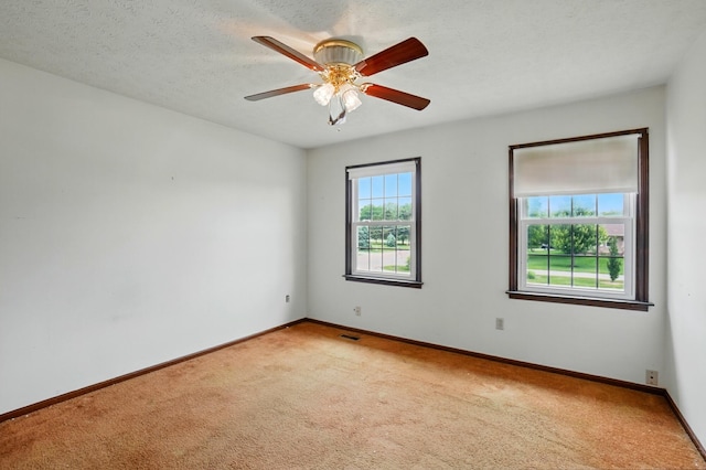 1985 Fox Run, Troy, OH 45373 - unfurnished room featuring light colored carpet and a ceiling fan