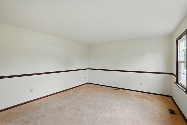 1985 Fox Run, Troy, OH 45373 - carpeted spare room with baseboards