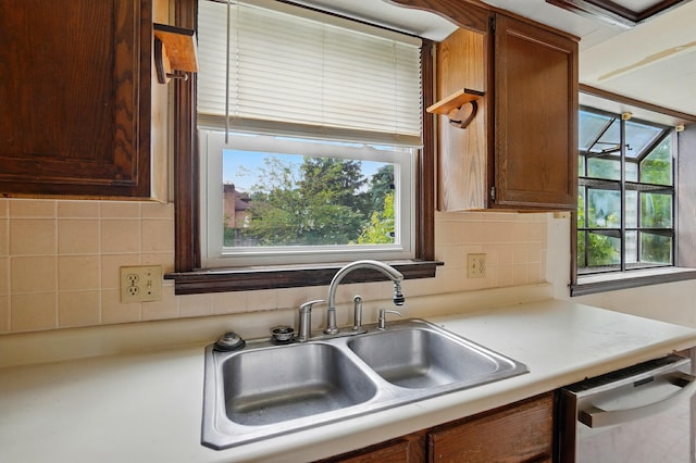 1985 Fox Run, Troy, OH 45373 - kitchen with dishwasher, light countertops, decorative backsplash, and plenty of natural light
