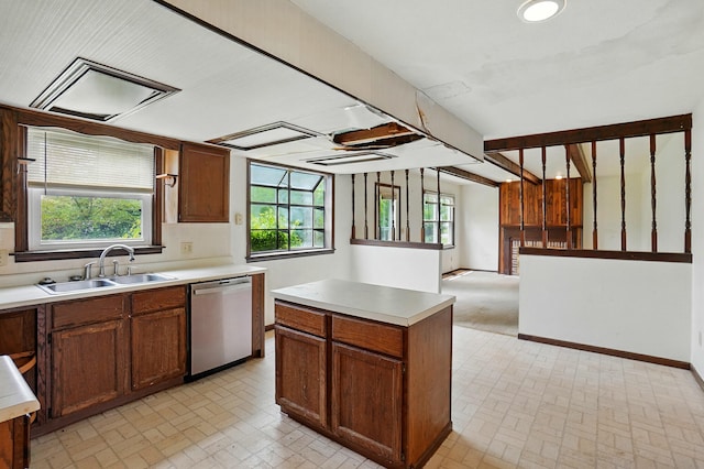 1985 Fox Run, Troy, OH 45373 - kitchen featuring dishwasher, brick patterned floors, and plenty of natural light