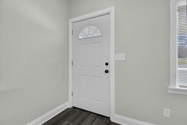 foyer with dark wood-type flooring