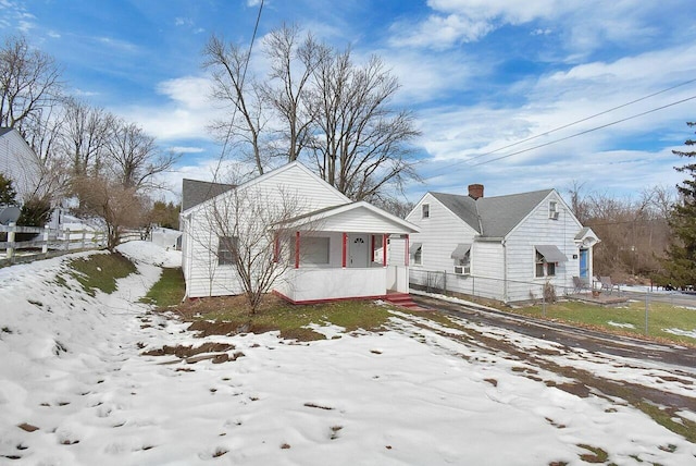 view of front of property featuring covered porch