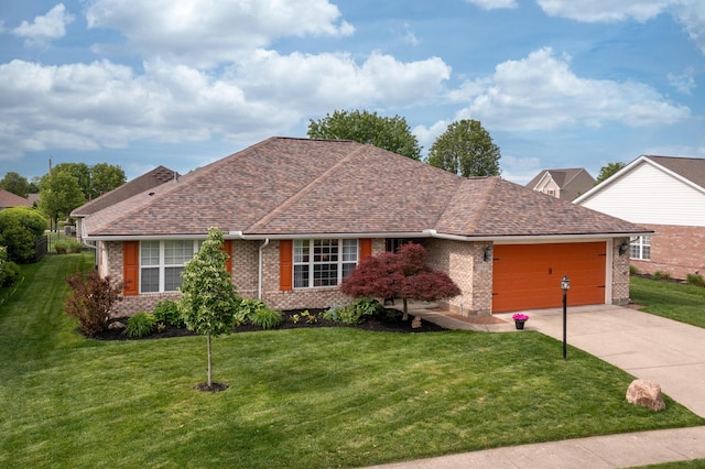 1280 Candlelite Ln, Fairborn, OH 45324 - ranch-style home featuring a garage, driveway, a front yard, and brick siding
