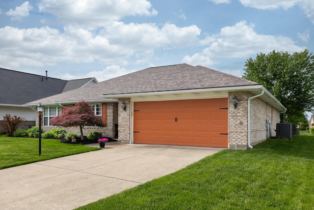 1280 Candlelite Ln, Fairborn, OH 45324 - ranch-style house featuring central air condition unit, an attached garage, a front lawn, concrete driveway, and brick siding