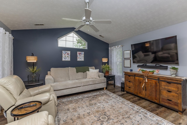 1280 Candlelite Ln, Fairborn, OH 45324 - living area featuring dark wood-style flooring, vaulted ceiling, ceiling fan, and a textured ceiling
