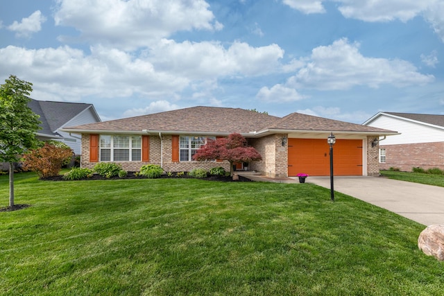 1280 Candlelite Ln, Fairborn, OH 45324 - single story home with driveway, a garage, a front yard, and brick siding