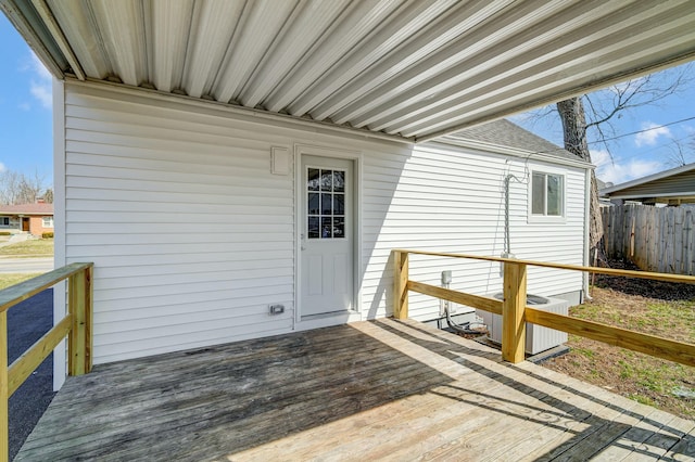 deck with cooling unit and fence