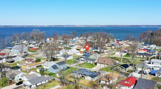 birds eye view of property with a residential view