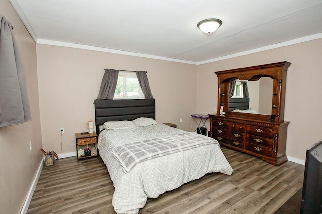 804 Robinson Ave, Kenton, OH 43326 - bedroom featuring wood finished floors and crown molding