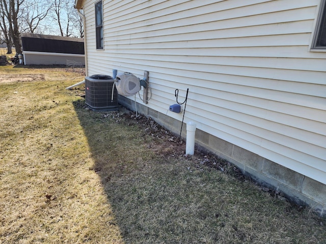 details with crawl space and central AC unit