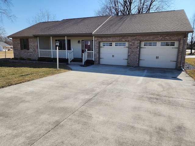 single story home with roof with shingles, covered porch, concrete driveway, and brick siding