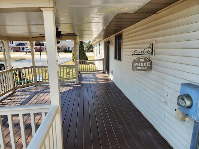 wooden terrace featuring covered porch