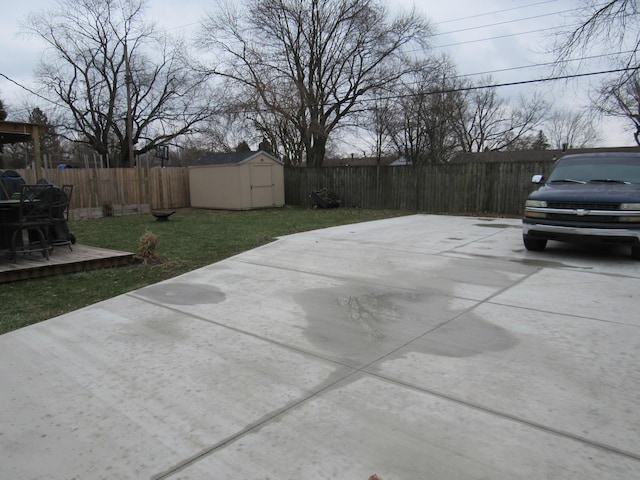 view of patio / terrace with a storage shed