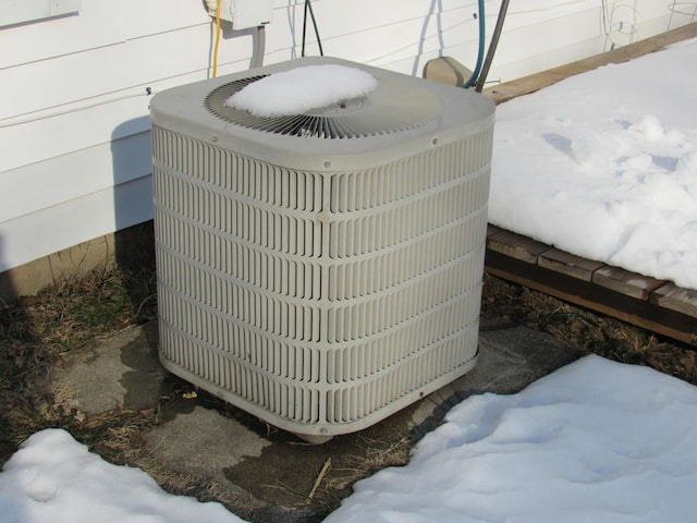 exterior details featuring cooling unit