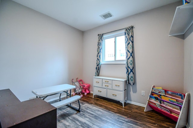 interior space with dark hardwood / wood-style floors