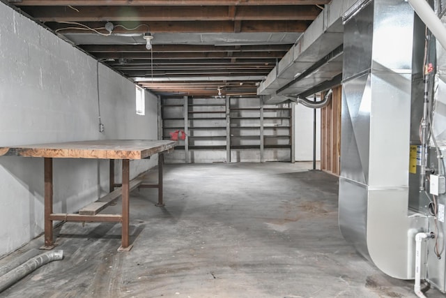 basement featuring heating unit