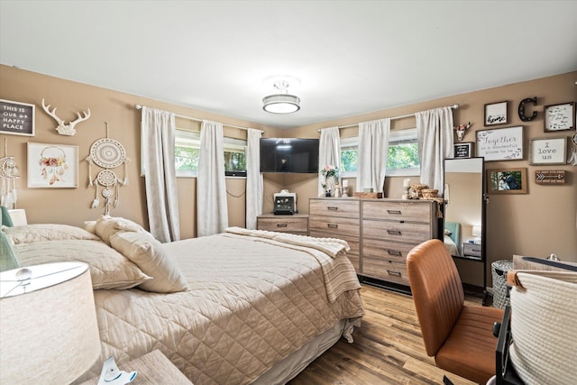 bedroom featuring light wood-type flooring