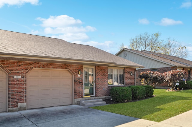 ranch-style house featuring a front yard, a garage, brick siding, and driveway