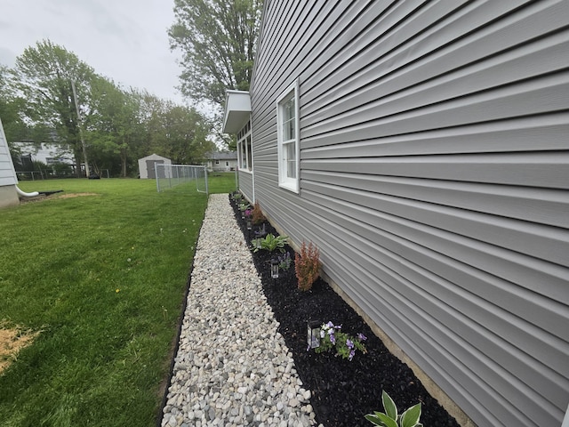 314 Concord Ave, Saint Marys, OH 45885 - view of property exterior featuring a yard and an outbuilding
